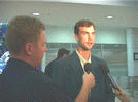 Published on 3/10/2002 Local media interview Falun Gong practitioner David Lubec as Australian practitioners welcome him home after his peaceful appeal for Falun  Gong on Tiananmen Square, 2002.