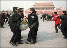 Published on 11/18/2004 Chinese police arrest German practitioner Andre Hubert who appealed for Falun Gong at Tiananmen Square. (2/2002)