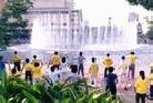 Published on 6/8/2001 On May 13, practitioners in Kuala Lumpur came to the park near the Double-Apex Tower--the highest building in the world--to promote Dafa.