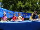 Published on 5/15/2001 The 2nd World Falun Dafa Day celebration activities in New York City were centered on showing people the mighty virtue and glory of Dafa. The main activities were centered in three areas: a photo exhibition showing the spread of Dafa in the past nine years called "The Journey of Falun Dafa," an Asian Culture Festival; and World Falun Dafa Day parade. The entire celebration was permeated with a warm atmosphere of solemnity, harmony, and dignity. 
