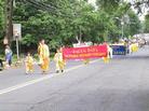 New Jersey Falun Gong Practitioners Participate in Memorial Day Parade and Receive the 'Best Innovation Award' on May 26, 2002