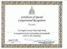 Published on 8/28/2003 Member of US Congress presents the certificate recognizing the practitioners’ outstanding and invaluable service to the community in Los Angeles.[August 10, 2003]