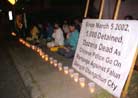 Published on 3/29/2002 Houston Dafa Practitioners Hold Candlelight Vigil at Chinese Consulate; Call for End to Jiang Regime’s Persecution of Changchun Practitioners 
