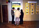 Published on 2/14/2002 During the Photo Exhibition in Latvia, Many People Learn Falun Gong Exercises Right on the Spot

