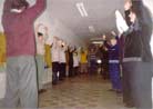 Published on 2/14/2002 During the Photo Exhibition in Latvia, Many People Learn Falun Gong Exercises Right on the Spot

