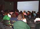 Published on 3/23/2002 Falun Gong’s response to persecution and violence" presentation and photo exhibit held at Nazareth College in Rochester New York 