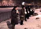 Published on 1/31/2002 Russian practitioners protest against the brutal persecution in front of the Chinese Consulate in St. Petersburg.