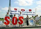 Published on 7/21/2002 Paris, France: A Peaceful Parade for Urgent Rescue on July 19th