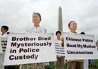 Published on 1/13/2001 Falun Gong Practitioners hold signs protesting the treatment of practitioners killed or detained by the Chinese Government while marching towards the U.S. Capitol in Washington, July 19, 2001. Supporters from around the world gathered in the nation’s capitol to mark the second anniversary of China’s brutal crackdown on Falun Gong Practitioners