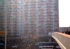 Published on 4/3/2002 Dafa Banner Clarifies the Truth in a Busy Beijing District