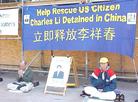 Published on 3/9/2003 休士顿大法学员在中领馆前呼吁中国政府立即释放美国公民李祥春
