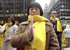 Published on 2/2/2002 AP Photo: Falun Gong practitioners petitioning during the World Economic Forum in New York.On January 31, 2002, Jingzhi Liu, of Montreal, and members of Falun Gong hold a peaceful [meditation] demonstration two blocks from the Waldorf-Astoria, site of the World Economic Forum.