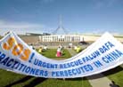 Published on 3/20/2002 News Photo (AP): Supporters of Falun Gong hold a peaceful protest outside the Australian parliament house in Canberra, Australia  on Tuesday, March 19, 2002

