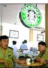 Published on 3/19/2002 BBC: The dark side of China. 
Police are present even in Starbucks.
