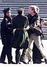 Published on 2/12/2002 AP: American, Canadian Detained in China on February 11, 2002


