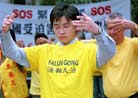 Published on 4/14/2002 AP Photo: Falun Gong Practitioners Hold a Rally in Downtown Chater Garden in Hong Kong Friday, April 12, 2002

