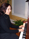 Published on 2/23/2006 女钢琴家：感谢神佛送给她这个法（图）