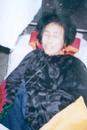 Published on 4/16/2001 Li Yanhua, a female practitioner who was around 60 years old, lived in Dongjiang Village, Nanlou Economic Development District, Dashiqiao City, Liaoning Province, in the northeastern region of China. On February 19th 2001, she distributed some Falun Gong flyers, hoping to clarify the truth about Falun Gong to local residents. She was turned in by an informer and brought to the Nanlou Economic Development District Police Station. The police proceeded to torture her in a desperate attempt to make her talk. Several of them mercilessly beat the slender old lady with police batons until she lost control of her bowels and bladder. At that point, nearly every inch of her body was covered with wounds. Blood began gushing from her nose, mouth, and ears, and she died on the scene. 
