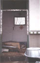 Published on 5/4/2002 赵传武家，房门及窗扇都被摘掉