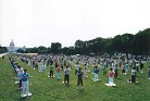 Published on 1/7/2002 Falun Gong practitioners "heshi" during large scale group practice on the national mall in front of Capitol Hill, Washington DC, 2002.