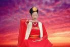 Published on 10/8/2003 Woman Falun Gong practitioner in tradititional Chinese dress practices Exercise Five, 2003.