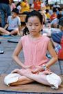 A young practitioner practiced sitting meditation during 2003 Taiwan Falun Dafa Cultivation Experience Sharing Conference.