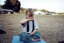 Published on 6/3/2000 Four year old girl from the US practices Falun Dafa sitting meditation, 2000.