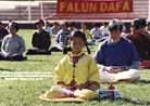 Published on 5/13/2000 Young Falun Dafa diciple sits in meditation during group practice in celebration of the First World Falun Dafa Day in Australia, May 2000.