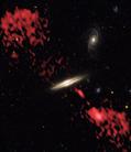 Published on 1/15/2003 NASA近期公布的哈勃新发现系列：螺旋星系竟产生巨大无线电射流（图）

