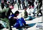 Published on 9/29/1999 Police brually dragged practitioners doing meditation.