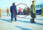 Published on 12/5/1999 According to the report from Amarillo Globe News, Chinese policemen on the Tiananmen Square quickly dragged over 20 Falun Gong practitioners sitting for meditation into the police vehicles, and drove away.