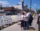 Published on 6/13/2001 Practitioners clarified the truth by displaying large posters, distributing leaflets and collecting signatures. The photo was shot on June 13, 2001