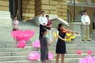 A Practitioner Performing Violin Solo of 'Pudu' to Celebrate 'Falun Dafa Week' in Front of Iowa State Capitol