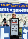 People from all walks of life join more than 1,000 practitioners in a rally in Washington D.C., calling for an end to the persecution of Falun Gong. Director of Freedom House Nina Shea makes a speech [July 20, 2006]