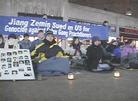 Published on 1/16/2003 Boston: Falun Gong Practitioners Hold Peaceful Appeal, Despite Cold Temperatures, to Urgently Call for an Immediate End to the Killing in China. Boston -- On January 13 and 14, Boston Falun Gong practitioners held a series of activities, including a candlelight vigil, to call upon the public to help stop the killing of Falun Gong practitioners in China. Since November 2002, reports of 43 Falun Gong practitioners being tortured to death have come to light and been verified outside of China. The deaths have continued to escalate despite some Falun Gong practitioners and their family members filing a lawsuit in US federal district court against Jiang Zemin, charging the dictator with the crime of genocide.