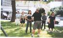 A cameraman from a TV station videotapes practitioners doing the exercise in San Antonio, July 6, 2001