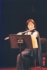 Falun Gong practitioner Ying Chen performs in a concert