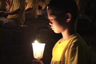 华盛顿DC烛光悼念活动中的小弟子