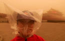 Published on 3/28/2002 A sand storm in Beijing accumulates sand at a rate of 3 kilograms per person.
