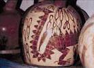 Published on 8/10/2003 Ancient culture: Pottery with dinosaur painting on it.