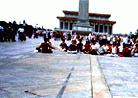 Published on 7/9/2000 On July 9, 2000, five Falun Gong practitioners appealed in sitting meditation at Tiananmen Sqaure. As the police were waiting for the police van, more than 20 practitioners joined their meditation. 