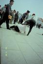 Published on 5/1/2001 Police beat a Falun Gong practitioner at Tiananmen Square, April 25, 2001. 