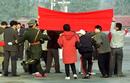 Published on 11/16/1999 Falun Gong practitioners who unfurled a banner on Tiananmen Square were arrrested. (1999)