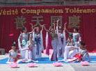 Montreal Falun Dafa Practitioners Celebrate the 10th Anniversary of the Public Introduction of Falun Dafa in Chinatown with Song and Dance  May 11, 2002
