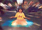 Published on 5/17/2001 Practitioners in Hawaii celebrate World Falun Dafa Day in the park.