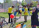 Published on 5/19/2001 A little is learning Falun Gong exercises.
