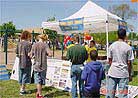Published on 5/19/2001 Citizens are looking at Falun Dafa photo display.