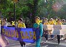Published on 5/13/2001 Practitioners parade in New York to awaken the people.
