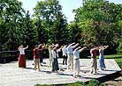 Published on 5/17/2001 Practitioners in Columbus hold a unique car parade, group practice and Fa study to celebrate May 13, 2001.